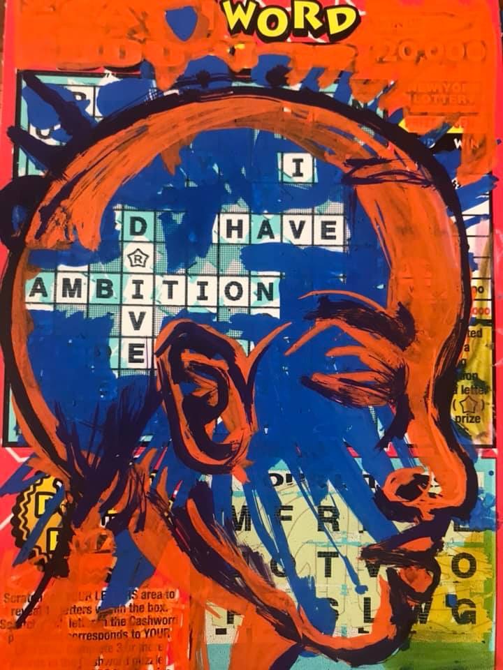 A vivid blue and orange profile of a person’s head is painted over a colorful crossword puzzle, evoking the creative spirit. Words in the grid spell “I HAVE AMBITION.” The background contains comic book-style text and bright hues. The artwork masterfully blends portraiture and typography.